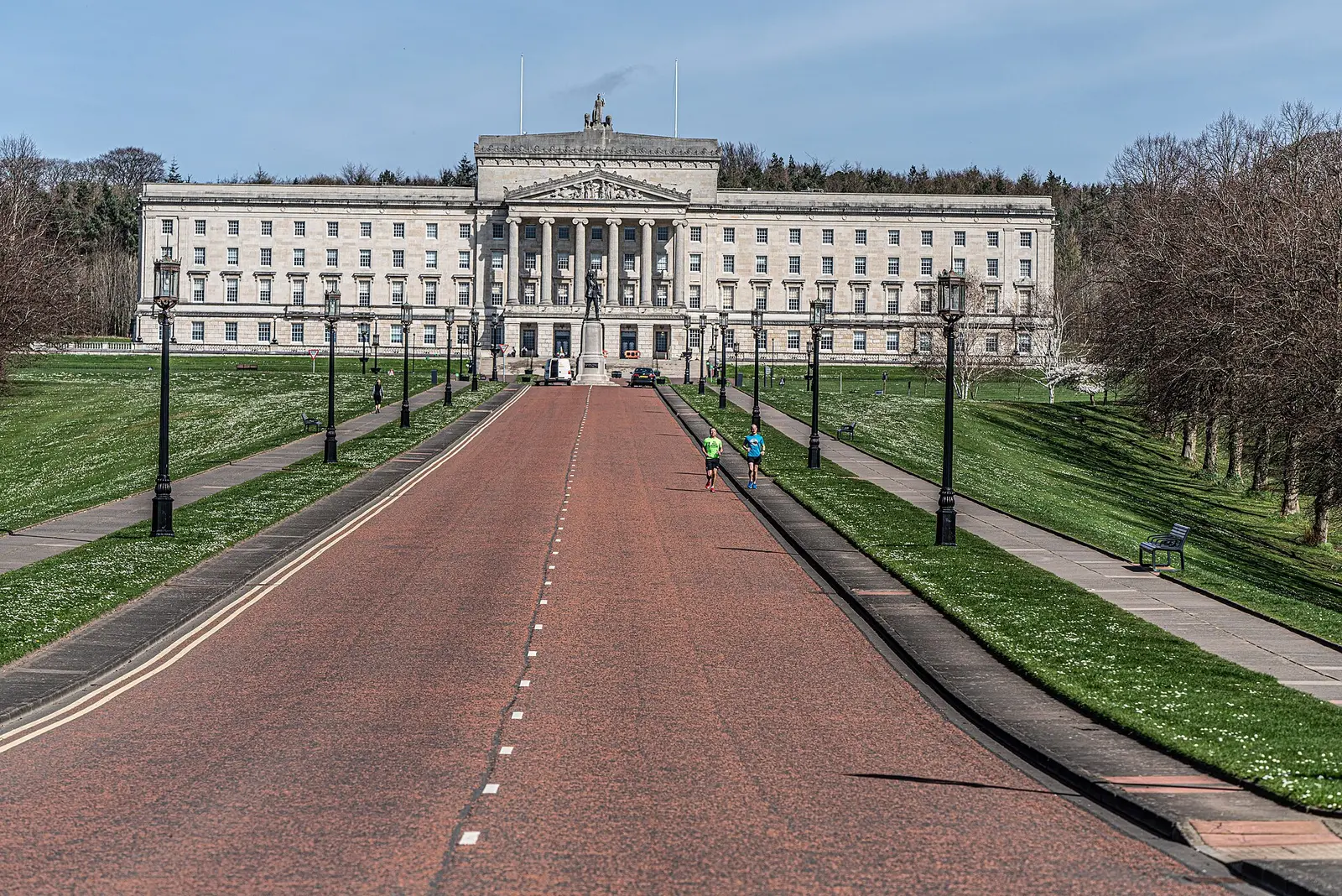 Parliament Buildings at Stormont seen along the long avenue with grass verges