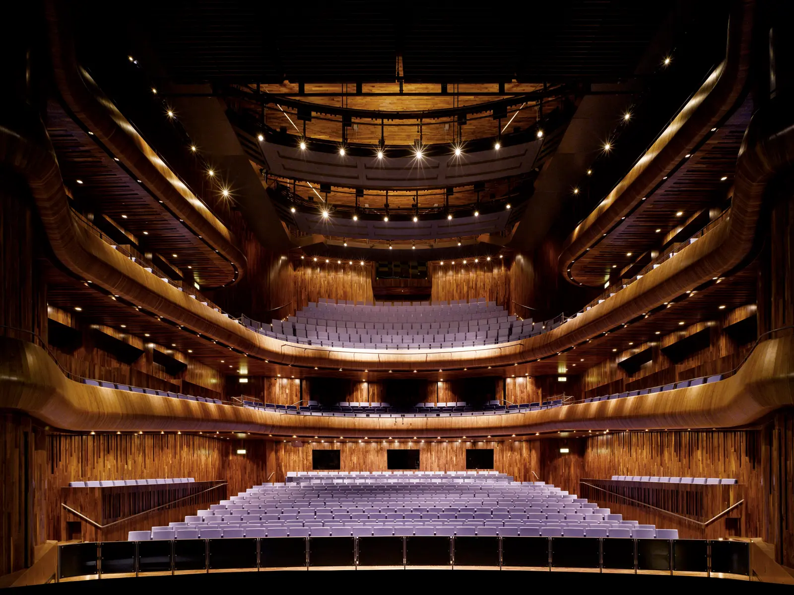 The timber-lined main auditorium of the National Opera House in Wexford seen from the stage